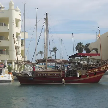 Next To Puerto Marina And The *